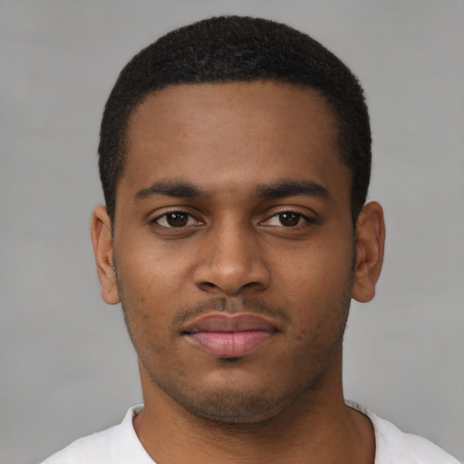 Neutral latino young-adult male with short  brown hair and brown eyes