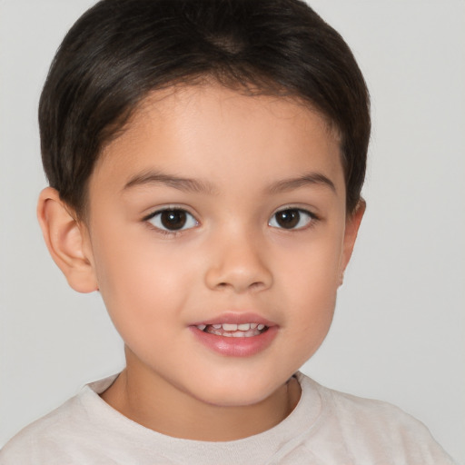 Joyful white child female with short  brown hair and brown eyes