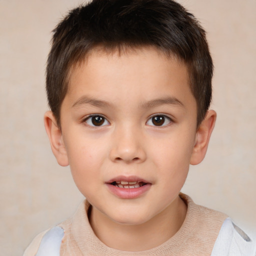 Joyful white child male with short  brown hair and brown eyes