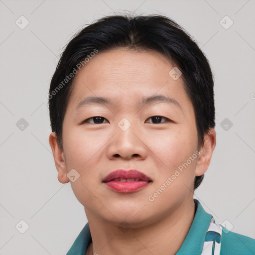 Joyful asian young-adult female with short  brown hair and brown eyes
