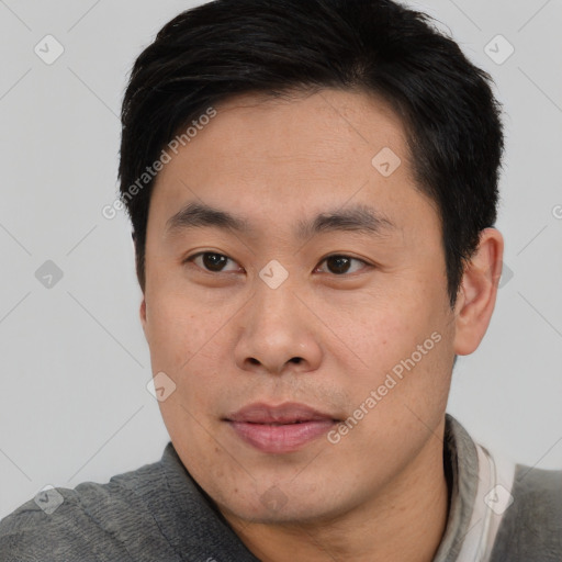 Neutral asian young-adult male with short  black hair and brown eyes