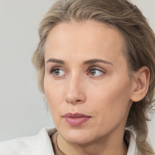 Neutral white adult female with medium  brown hair and brown eyes