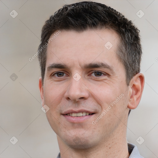 Joyful white young-adult male with short  brown hair and brown eyes