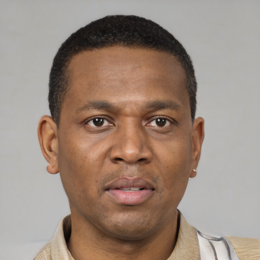 Neutral latino adult male with short  black hair and brown eyes