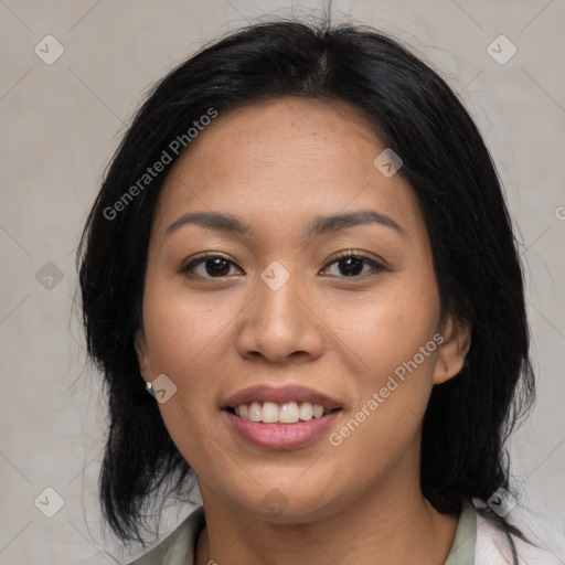 Joyful asian young-adult female with medium  black hair and brown eyes