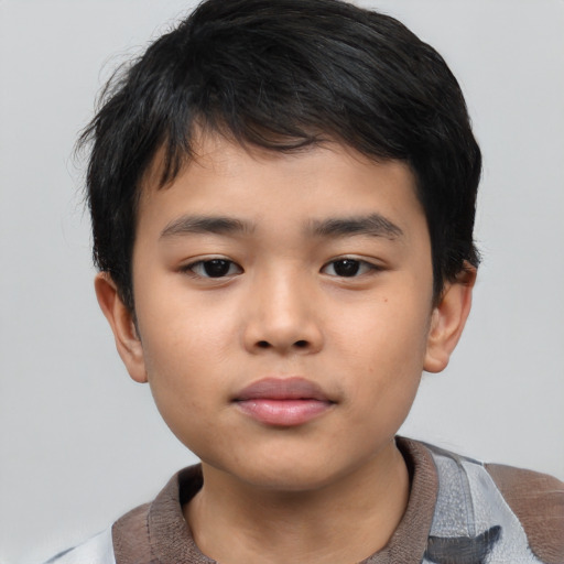 Neutral asian child male with short  brown hair and brown eyes