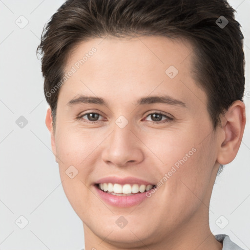 Joyful white young-adult female with short  brown hair and brown eyes