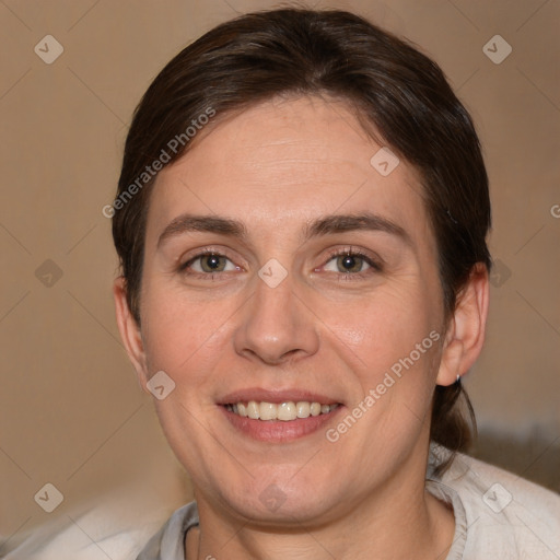 Joyful white adult female with short  brown hair and brown eyes