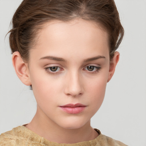 Neutral white child female with short  brown hair and grey eyes