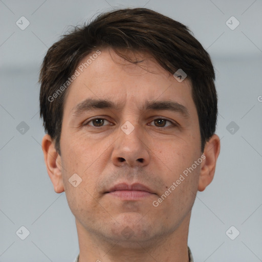 Neutral white adult male with short  brown hair and brown eyes