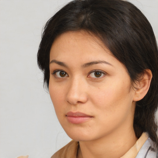 Neutral asian young-adult female with medium  brown hair and brown eyes