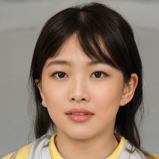 Neutral asian child female with medium  brown hair and brown eyes