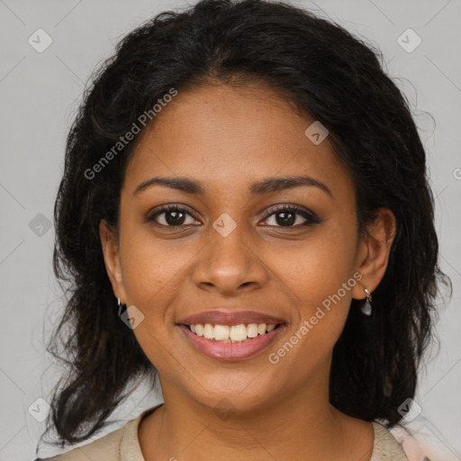 Joyful black young-adult female with medium  brown hair and brown eyes