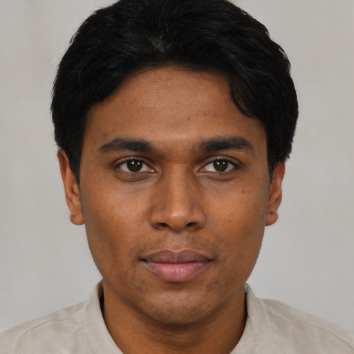 Neutral black young-adult male with short  black hair and brown eyes
