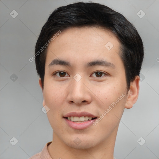 Joyful asian young-adult male with short  brown hair and brown eyes