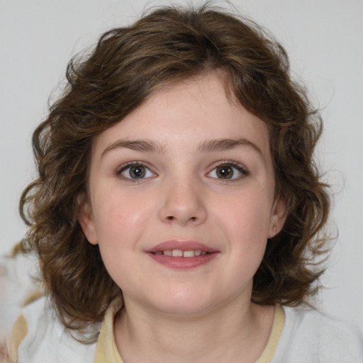 Joyful white child female with medium  brown hair and brown eyes