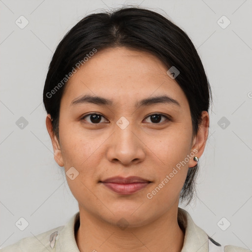 Joyful asian young-adult female with medium  brown hair and brown eyes