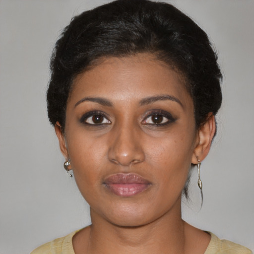 Neutral black young-adult female with medium  black hair and brown eyes