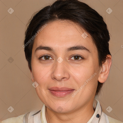 Joyful white adult female with medium  brown hair and brown eyes