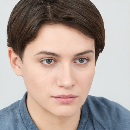 Neutral white young-adult female with short  brown hair and brown eyes