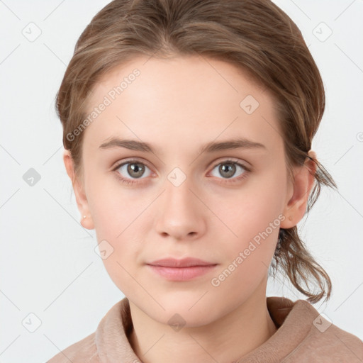 Neutral white young-adult female with medium  brown hair and grey eyes