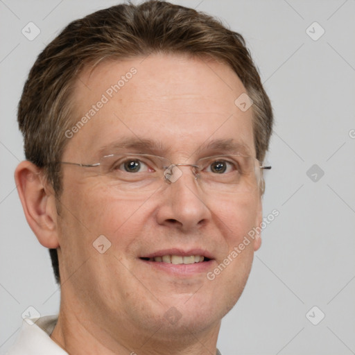 Joyful white adult male with short  brown hair and grey eyes