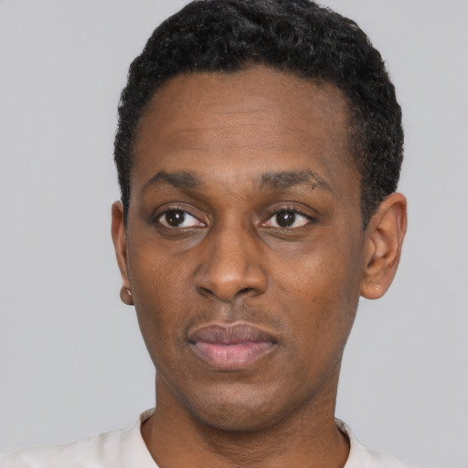 Neutral black young-adult male with short  black hair and brown eyes