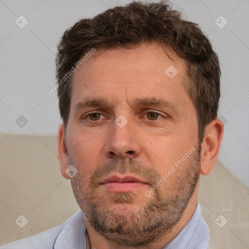 Neutral white adult male with short  brown hair and brown eyes