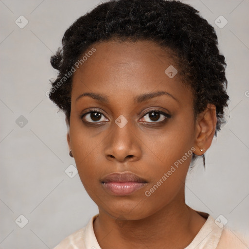 Neutral black young-adult female with medium  brown hair and brown eyes