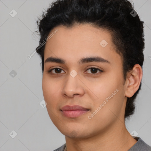 Joyful latino young-adult female with short  black hair and brown eyes