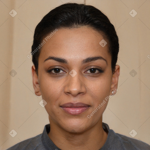 Joyful latino young-adult female with short  black hair and brown eyes