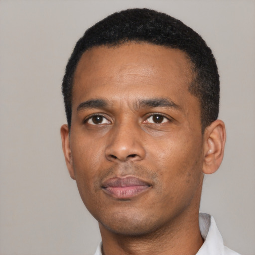 Neutral black young-adult male with short  black hair and brown eyes