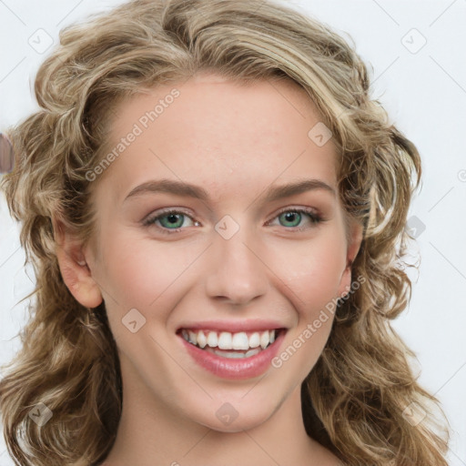 Joyful white young-adult female with long  brown hair and blue eyes