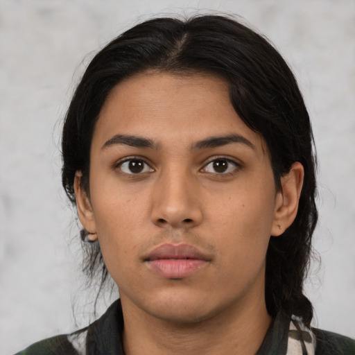 Neutral latino young-adult female with medium  black hair and brown eyes