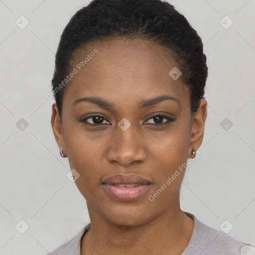 Joyful black young-adult female with short  black hair and brown eyes