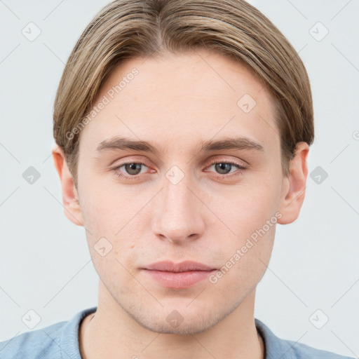 Neutral white young-adult male with short  brown hair and grey eyes