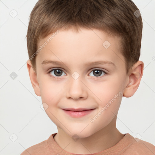 Joyful white child male with short  brown hair and brown eyes