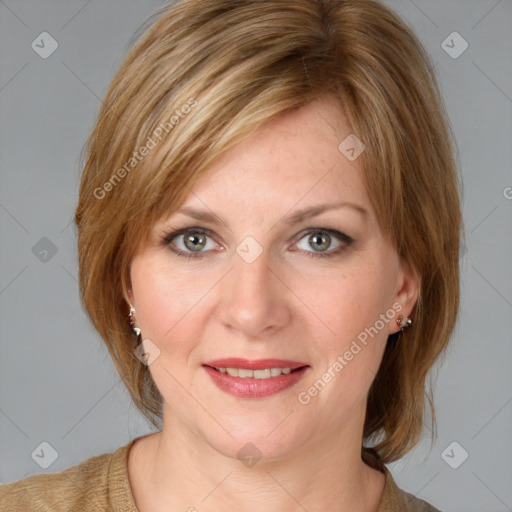 Joyful white young-adult female with medium  brown hair and blue eyes