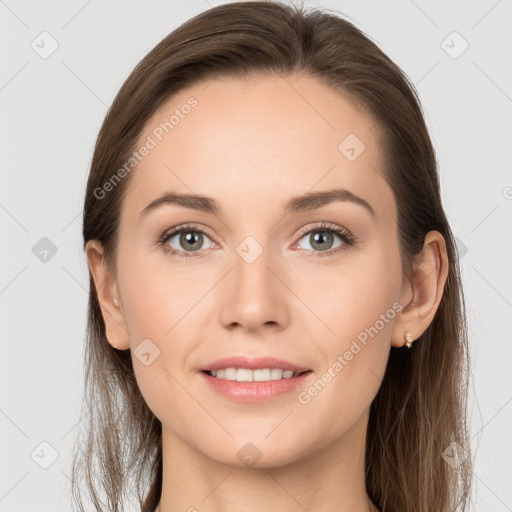 Joyful white young-adult female with long  brown hair and grey eyes