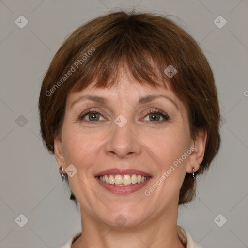 Joyful white adult female with medium  brown hair and grey eyes