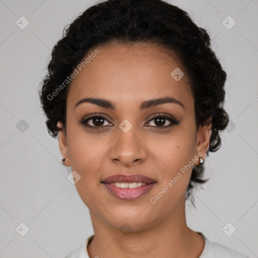 Joyful latino young-adult female with short  brown hair and brown eyes