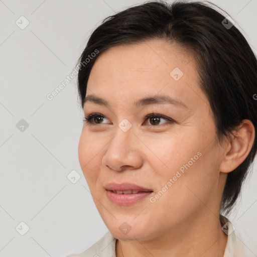 Joyful white young-adult female with medium  brown hair and brown eyes