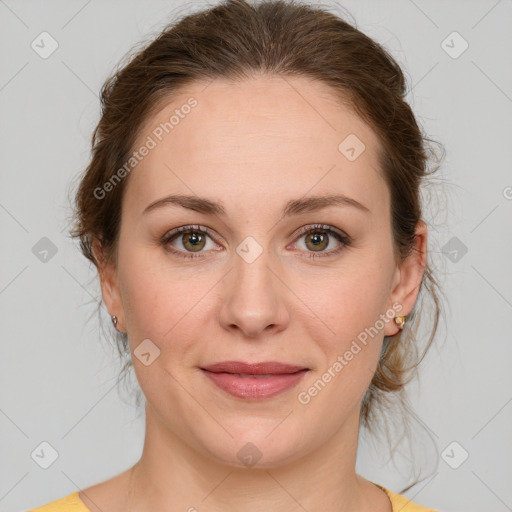 Joyful white young-adult female with medium  brown hair and green eyes