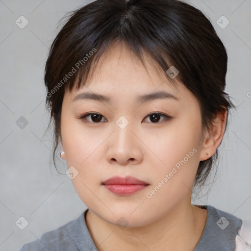 Neutral asian young-adult female with medium  brown hair and brown eyes