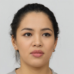 Neutral asian young-adult female with medium  black hair and brown eyes