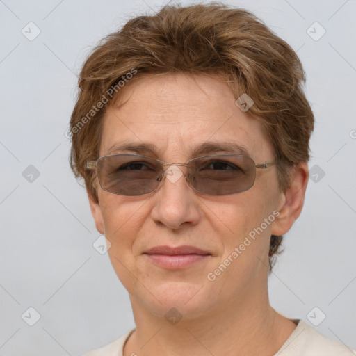 Joyful white adult female with short  brown hair and brown eyes