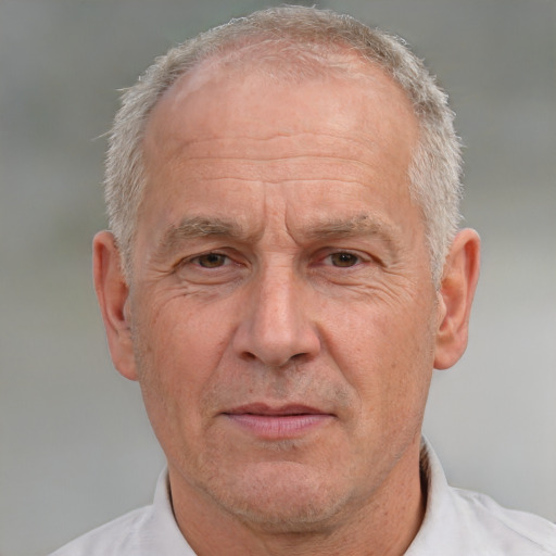 Neutral white middle-aged male with short  gray hair and brown eyes