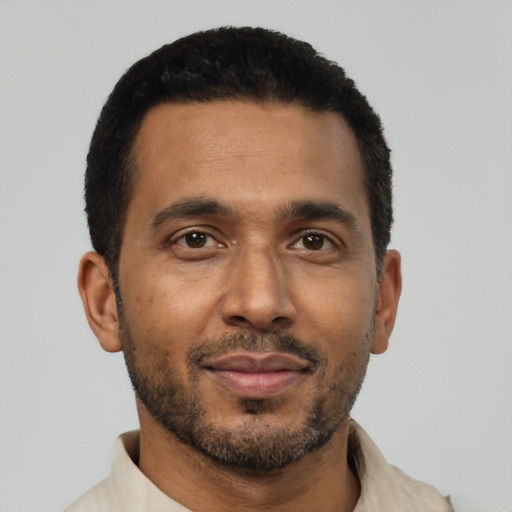 Neutral black young-adult male with short  black hair and brown eyes