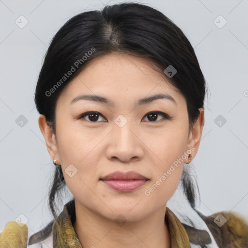 Joyful asian young-adult female with medium  brown hair and brown eyes