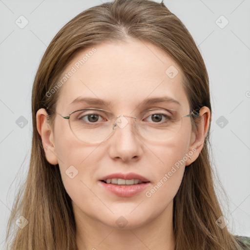 Joyful white young-adult female with long  brown hair and blue eyes